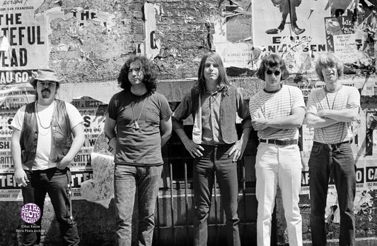 Grateful Dead shot in front of a Mural